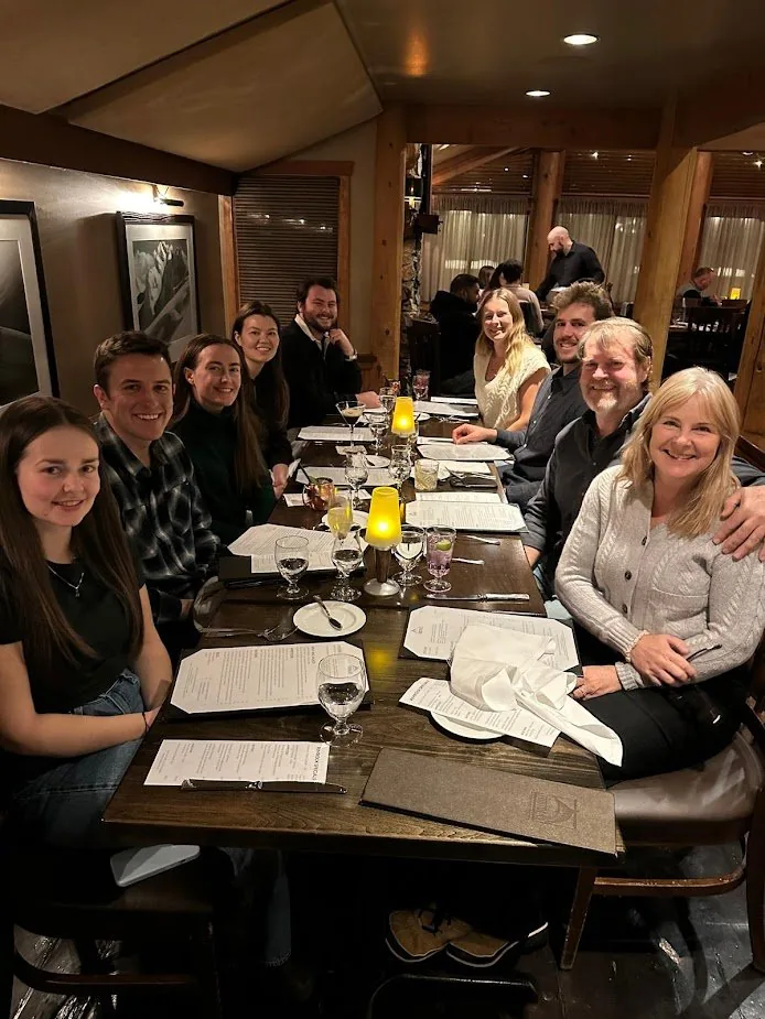 Both families together at dinner