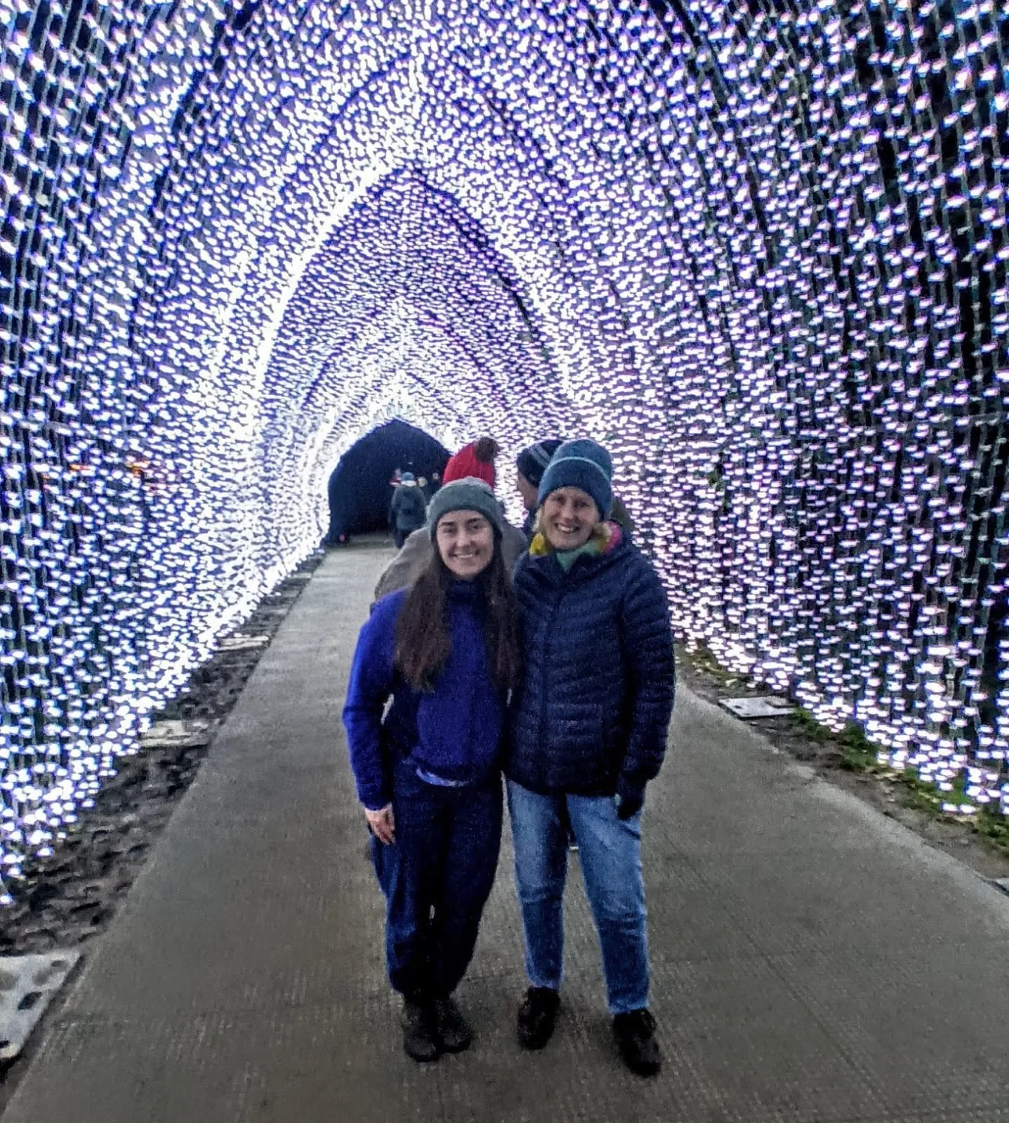 Walking through a tunnel of fairy lights at Christmas