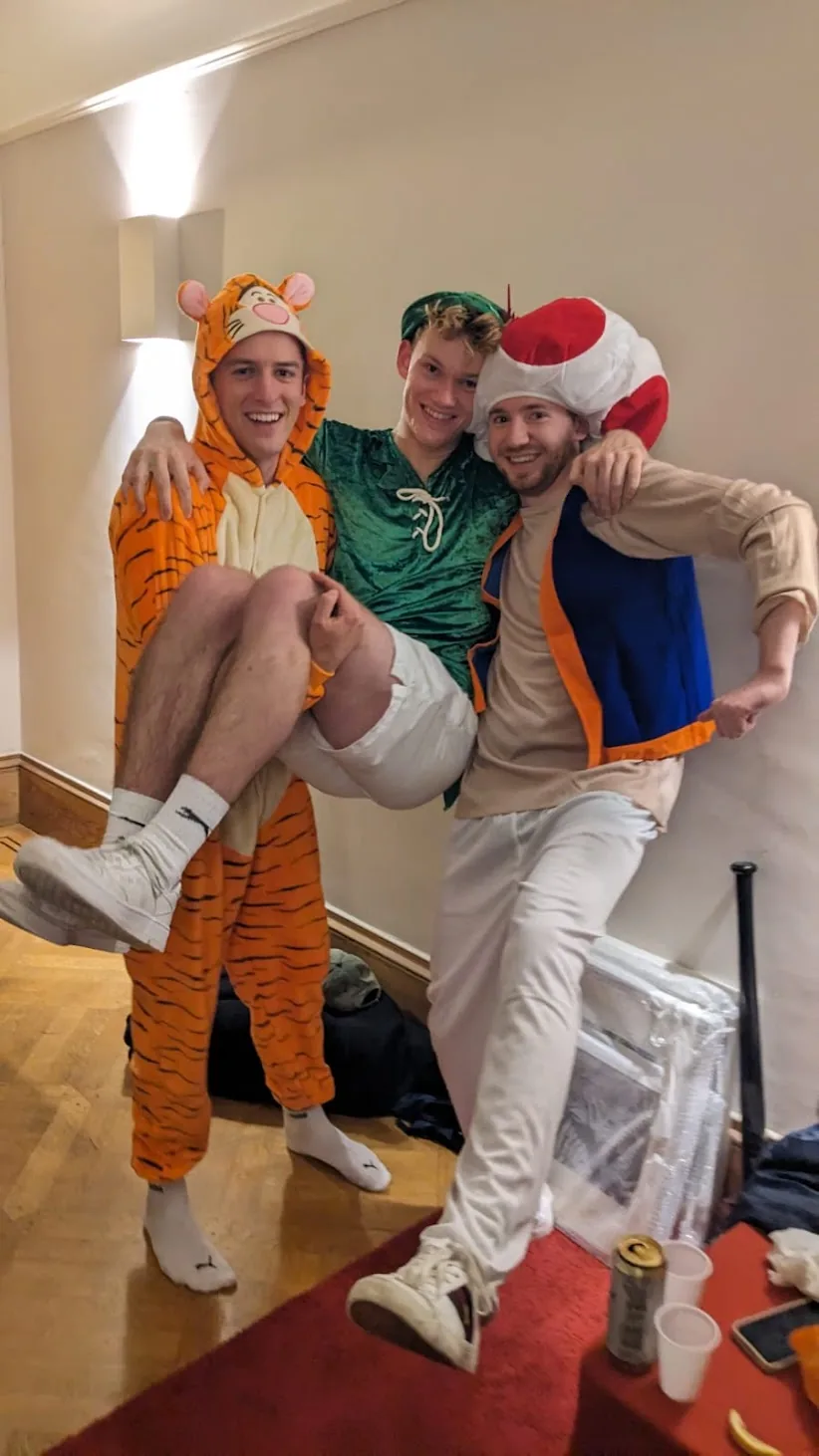 Friends in onesies — Tigger, fairy and Toad
