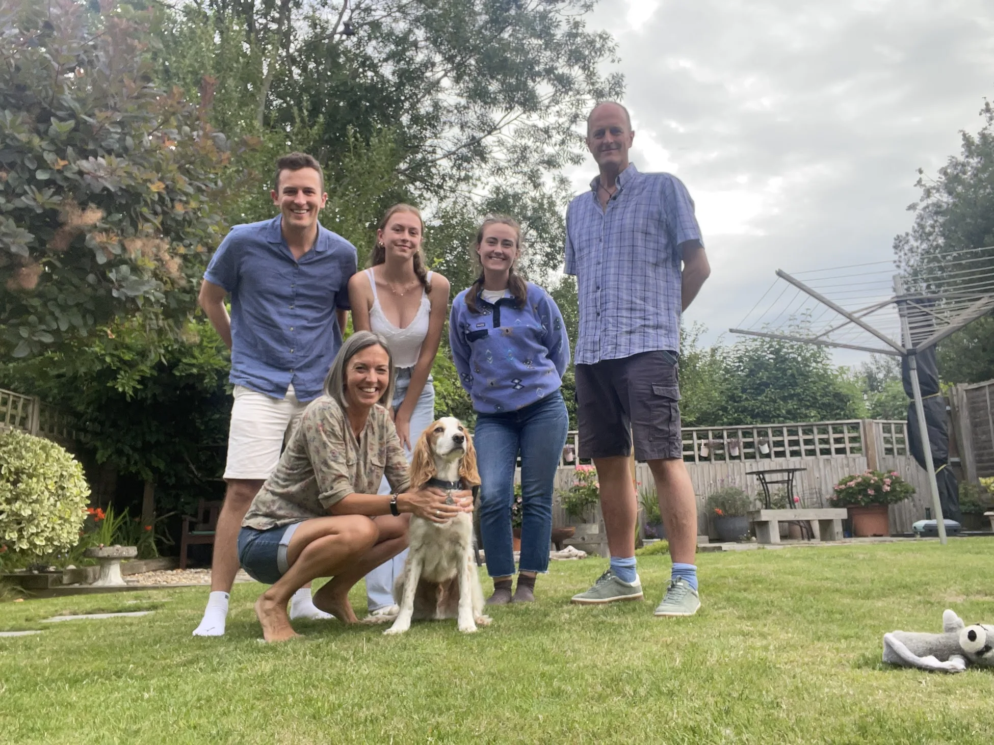 Family in the garden with the dog