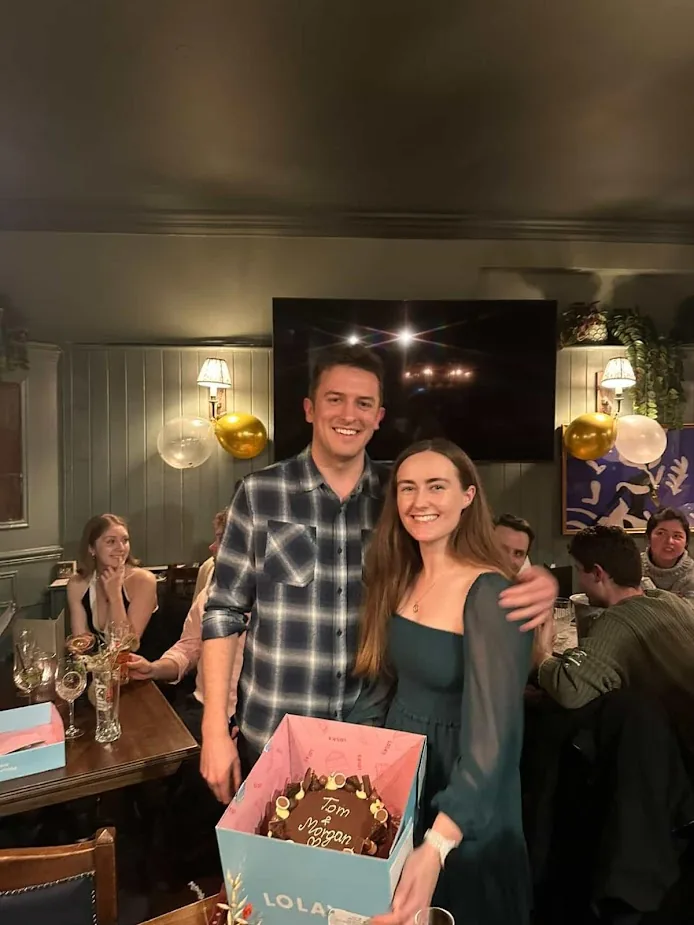 With a celebration cake